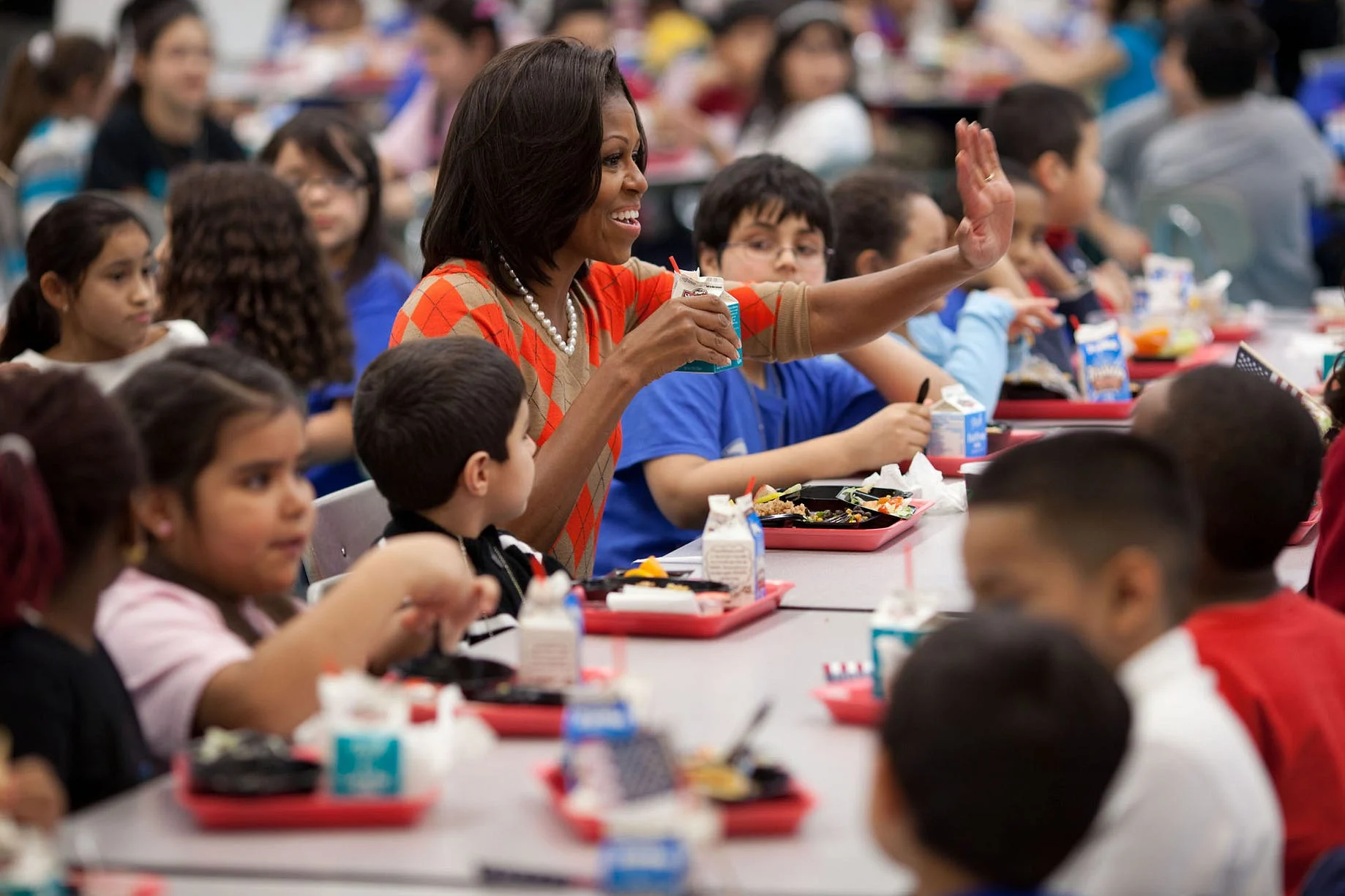 Image result for michelle obama teachings kids how to eat