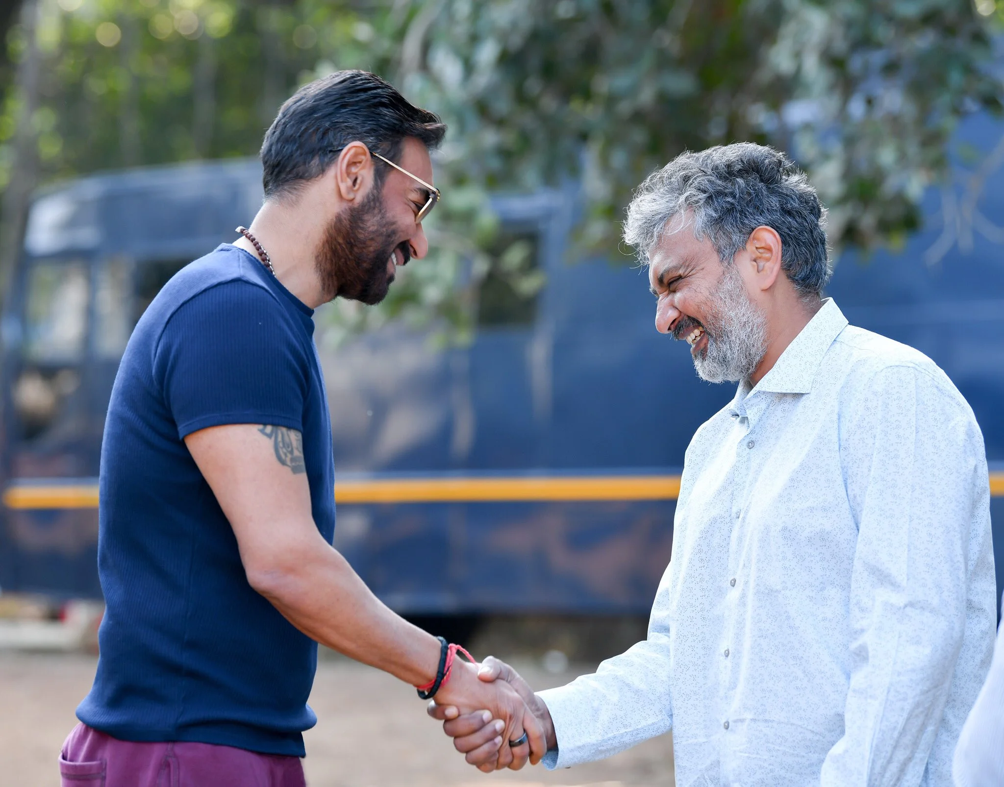 rrr ajay devgn and ss rajamouli share a delightful moment as they begin shooting for the film today see pics