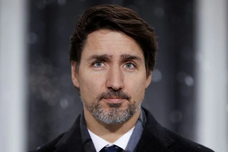 FILE PHOTO: Canada's Prime Minister Justin Trudeau attends a news conference at Rideau Cottage, as efforts continue to help slow the spread of coronavirus disease (COVID-19), in Ottawa, Ontario, Canada April 9, 2020. REUTERS/Blair Gable/File Photo