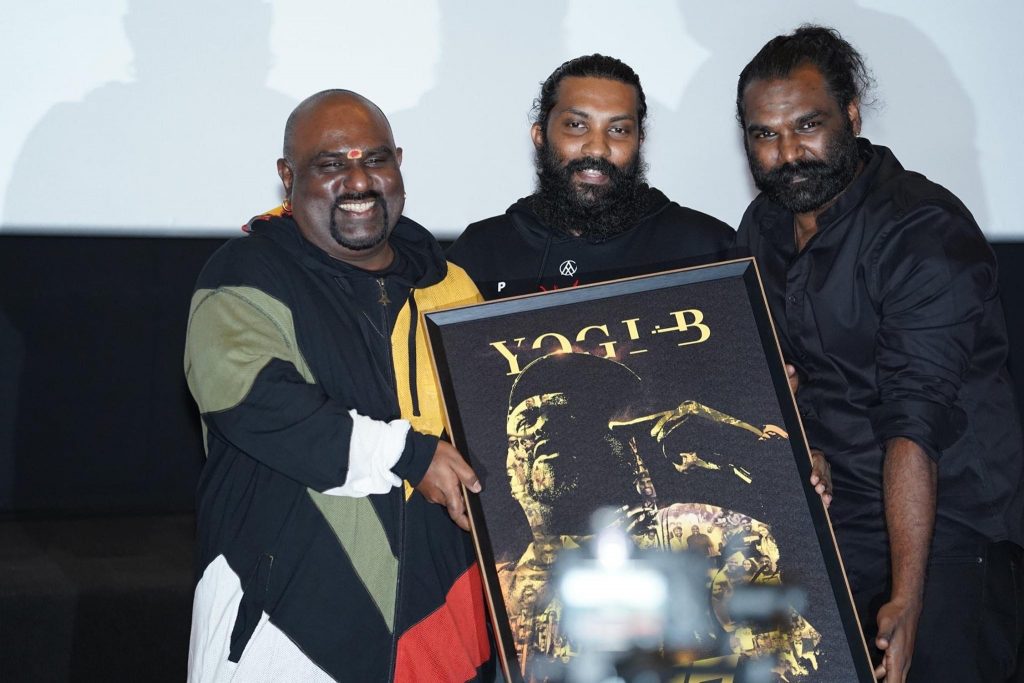 Yogi B receiving token of appreciation from JK Wicky & Ganesan