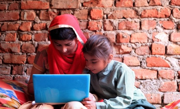 indian women using laptop at home picture id804145938 696x421 1