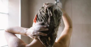 woman washing hair shampoo shower 1200x628 facebook 1200x628 1