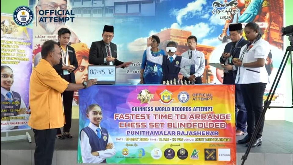 Perak girl breaks Guinness World Record in blindfolded chess set